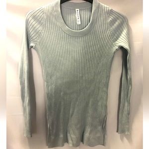 NWOT Beautiful baby blue. Will fit beautifully under anything or by itself.